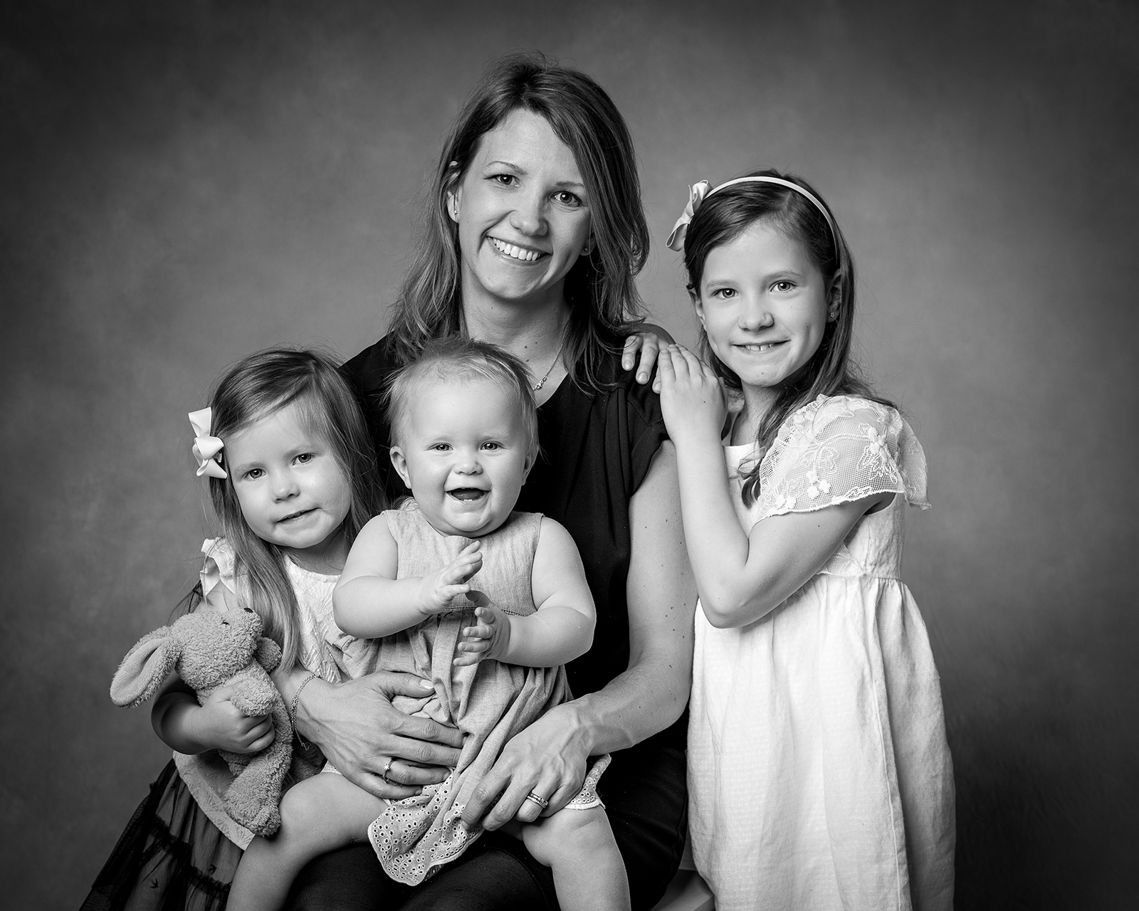 Barnfotografering med mamma och tre barn